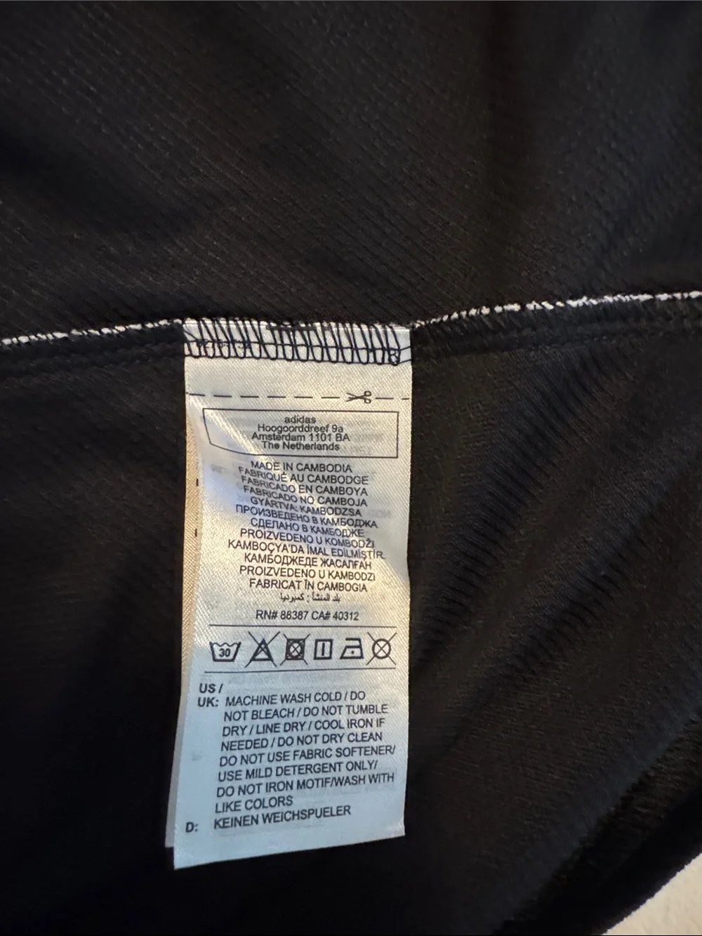 adidas Men's Black and White Quakes Polo Shirt